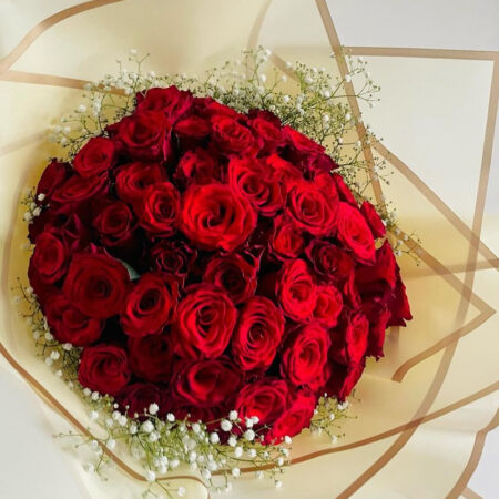 Red Roses Wrapped with Babys Breath