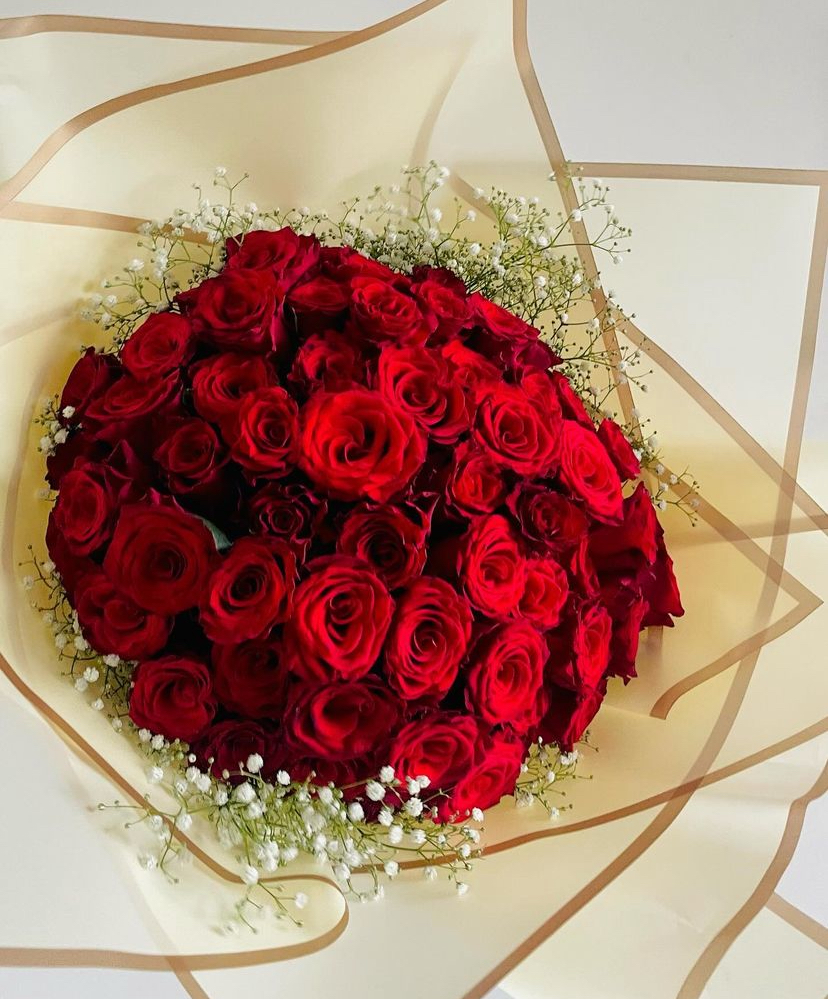 Red Roses Wrapped with Babys Breath